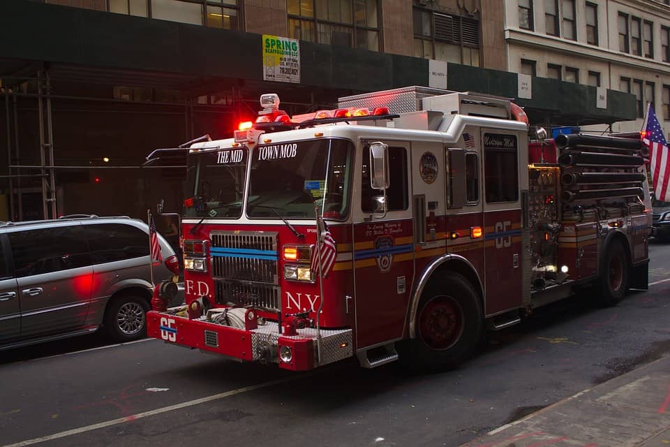 NYC fire truck on the road responding to a fire alarm